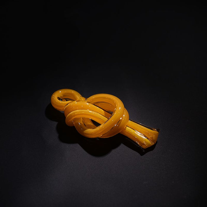 ESCULTURA DE VIDRIO KNOT AMARILLO