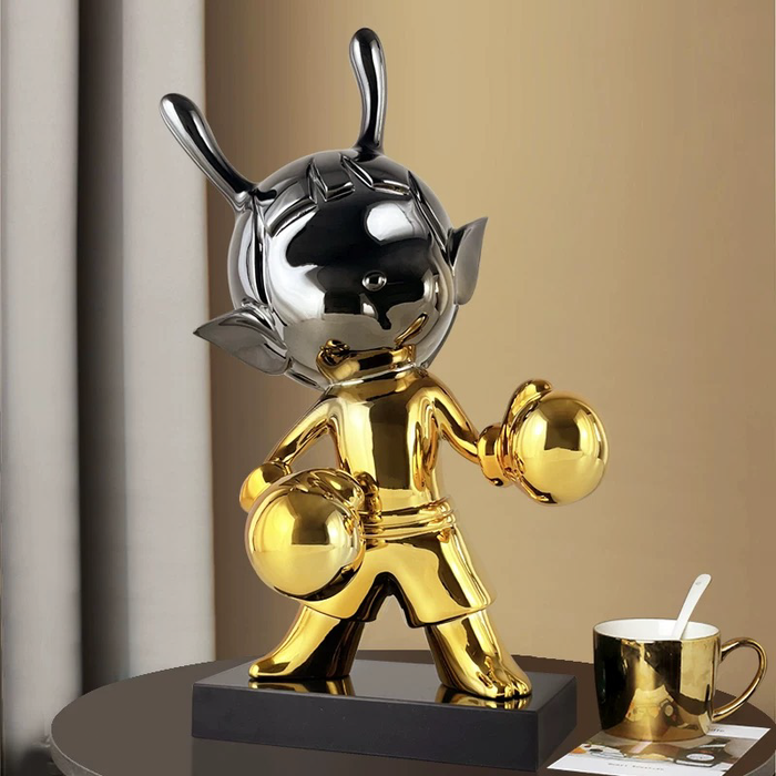 ESCULTURA DE RESINA BOXING ALIEN GOLD
